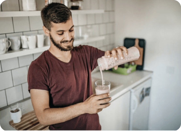 Man in kitchen with shake