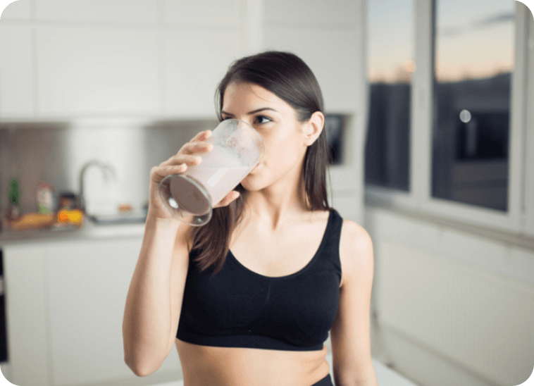 Woman in kitchen with Rootana shake